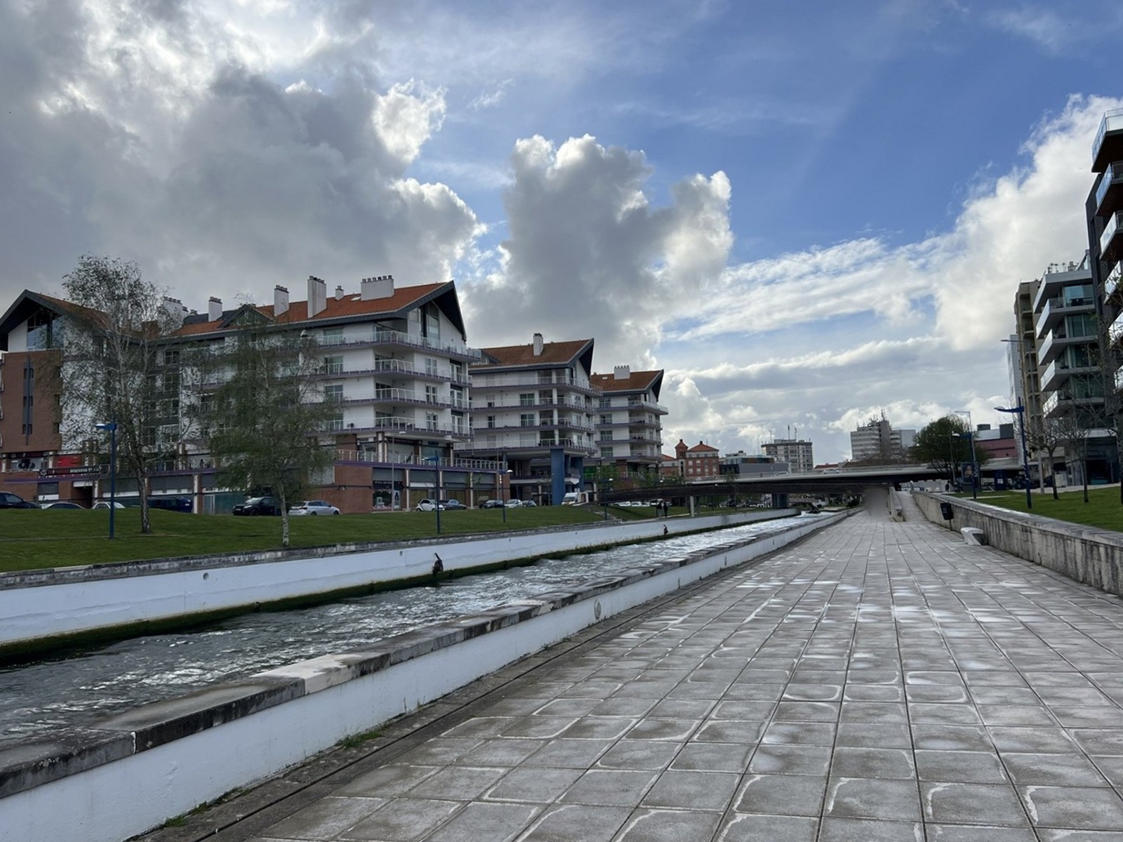 Low modern apartment buildings along the canal
